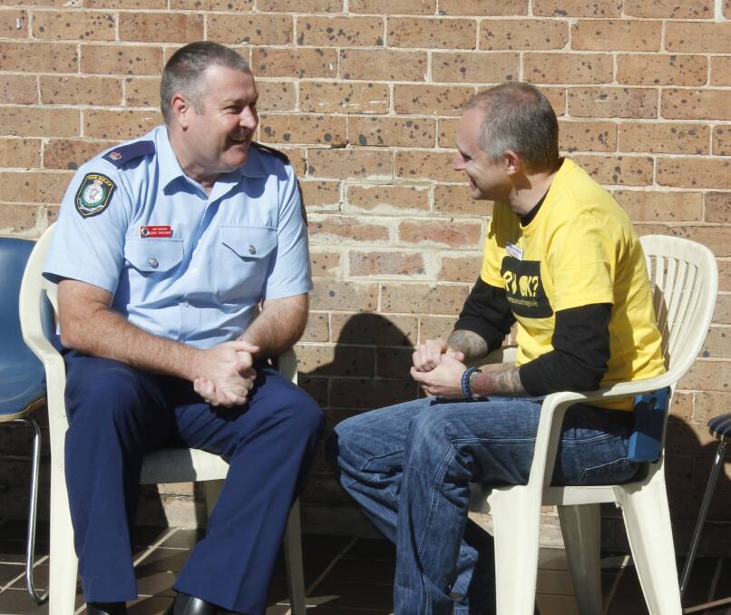 Inspector John Sheehan and Area Manager of South Eastern NSW & ACT Mission Australia Dan Strickland asking "R U OK" to each other. Photo Burney Wong. 