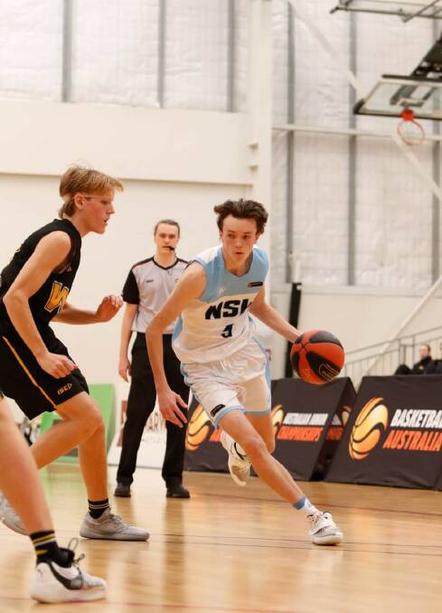 Bounce: Ryder Edwards in action during the u16s Australian Junior Championships. Photo: Basketball NSW. 