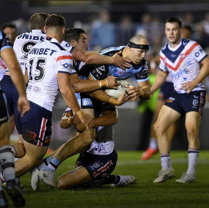 Charge: Tom Hazelton in action for the Cronulla Sharks during his debut. Photo: Supplied.
