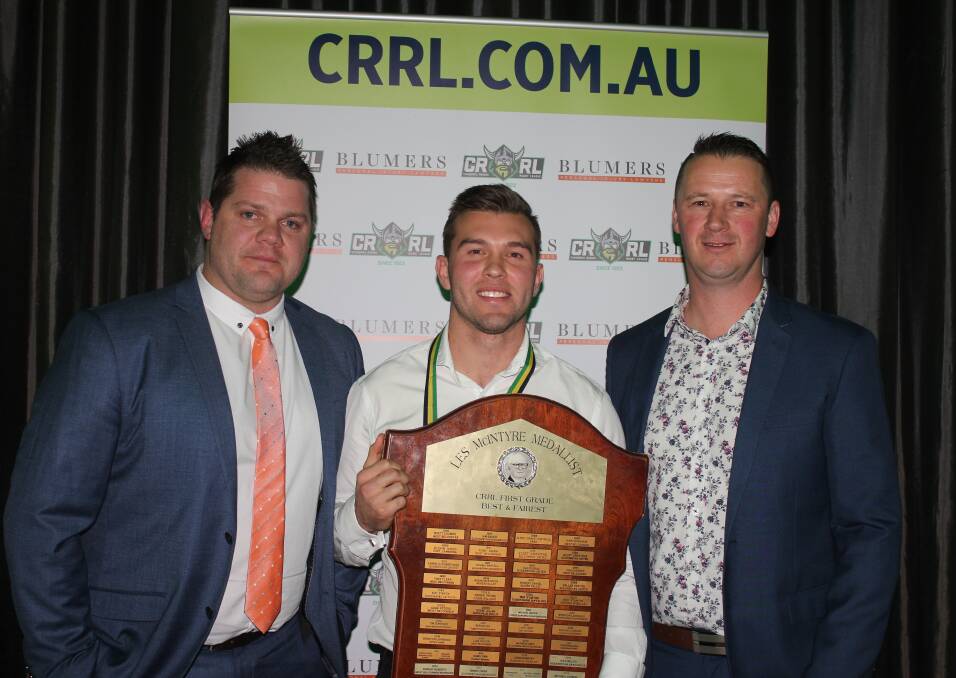 Best and fairest: Les McIntyre medalist Mitch Cornish with Goulburn Bulldogs coach Adam Kyle and president Joe Stephens. Photo: Burney Wong.