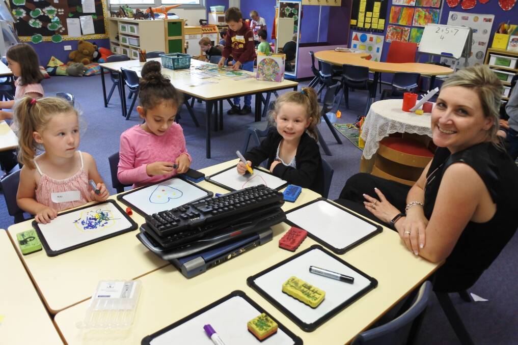 All smiles: The NSW School Curriculum is undergoing a transformation in the next four years. Photo: file. 