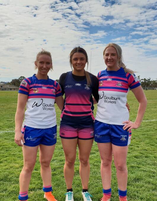 First to 50: (from left) Amy Day, Ellen Day, and Jess Antony have been with the league tag side for four years. Photo: Zac Lowe.