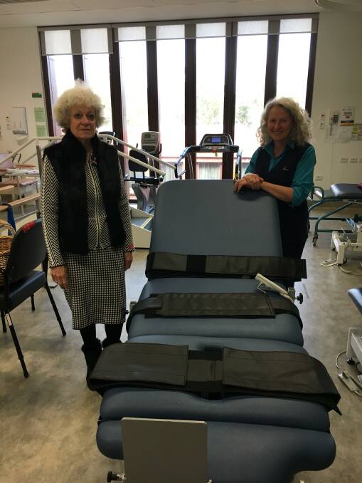 Nerida Cullen and Goulburn Base Hospital Physiotherapist Jane Twohill with the new tilted table. 