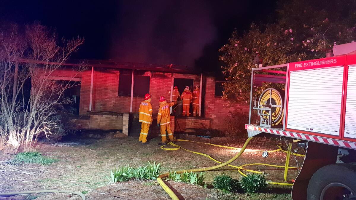 Crews battle to contain a house fire in Tallong on Monday night. Photo courtesy Tallong RFS.