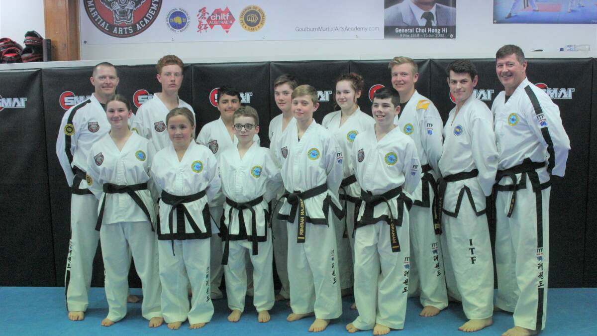 Nine taekwondo students earn black belts