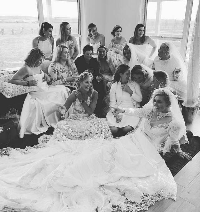 The 'Bride Tribe' dressed in their wedding attires for the fundraising event 'Girls Night In'. Photo: What's On Media Australia