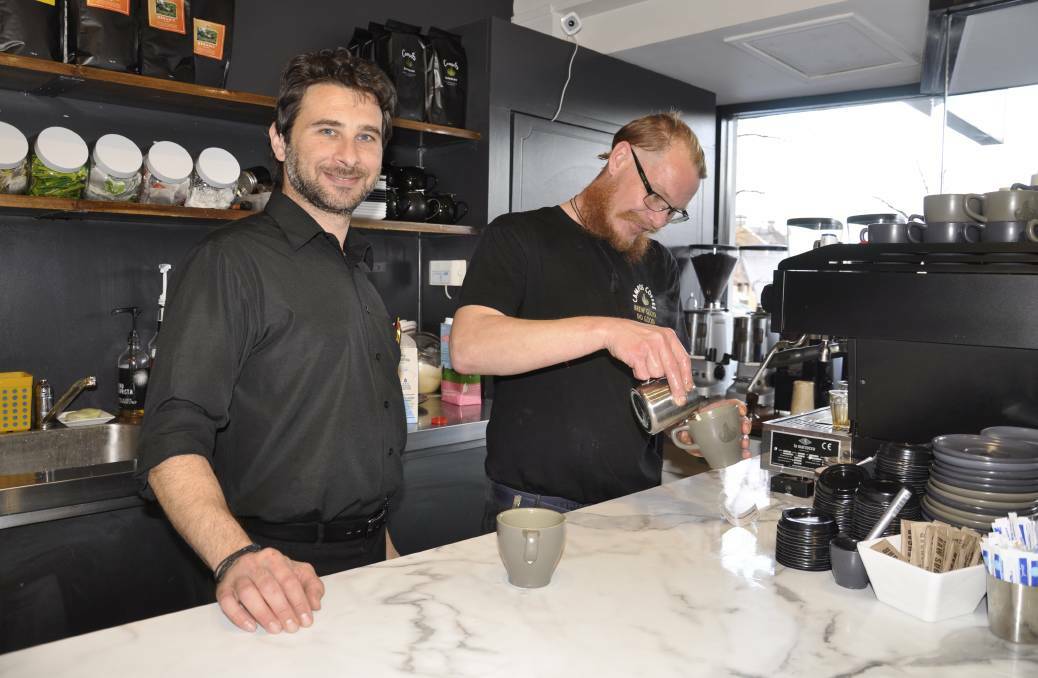 Park Cafe owner/manager Laz Foinikopoulos, with barista Tom Gaskin. Photo: Louise Thrower.