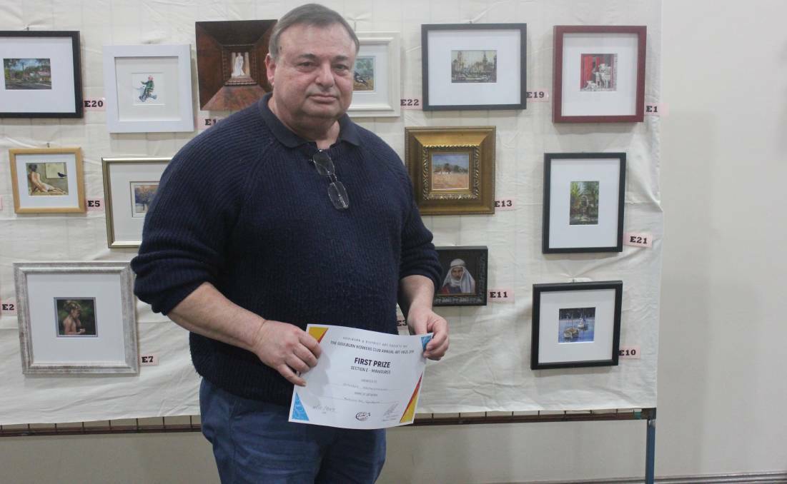 Stavros Papantoniou won the first prize in the miniatures category with his drawing of Auburn Street in 2019 Goulburn and District Art Society's art prize event. File pic
