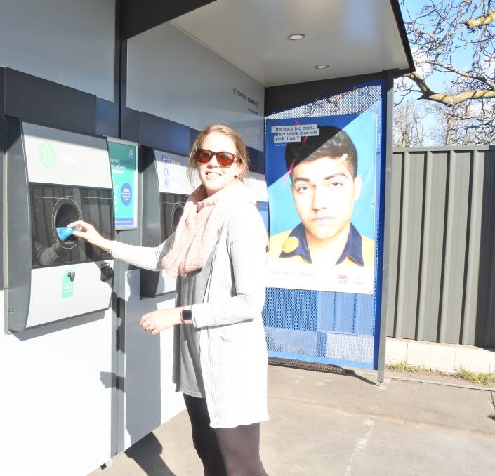 Jess Miller has been using the Return and Earn vending machine for over a year now and think "it is a great idea". Photo: Neha Attre