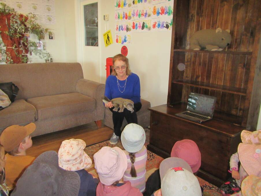 Elizabeth Grice talking to a group of pre-schoolers at Imaginations Early Education in Goulburn, raising awareness about the iconic animals in Australia. Photo: Supplied.