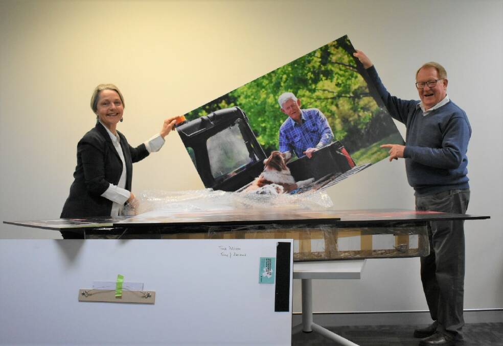 Tina Milson and Mayor Bob Kirk with one of the portraits. Pic: Neha Attre 