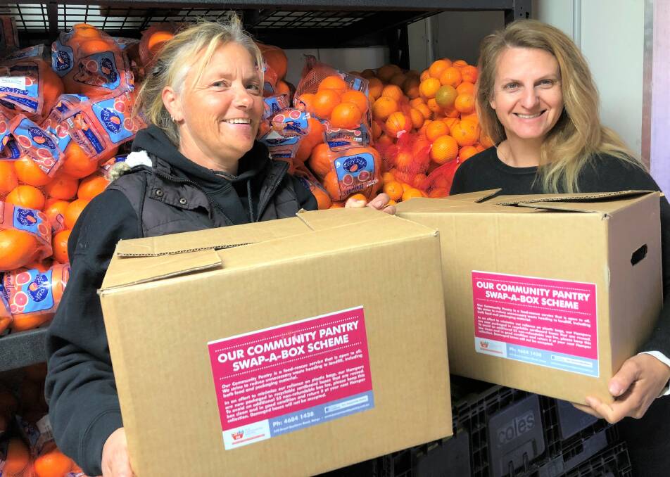 HELPING THE NEEDY: Founder of Our Community Pantry Paula Zrilic (R) with farmer Tania Willett (L) who is based in Wayo. Photo: Supplied