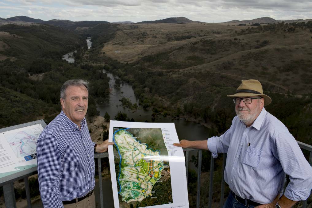Riverview director David Maxwell and planning consultant Tony Adam at Shepherds Lookout in the ACT. Photo: Sitthixay Ditthavong