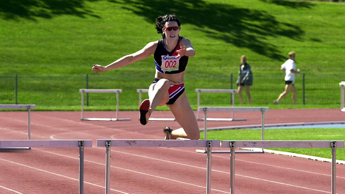 Jana Pittman competing in hurdles. Photo Adam McLean.
