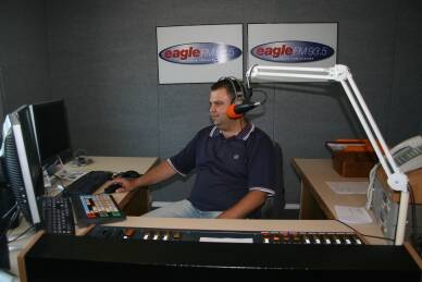 ON THE AIR: Eagle FM's new morning announcer, Rick Shipp, in the studio.