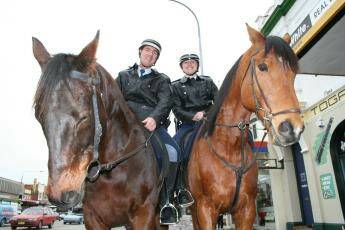 HORSE PATROLS KICK OFF: Goulburn's newest mounted police Senior Constable Bradley Jones riding Let's Jive and Constable Jo Cummins riding Sergeant did their first street patrol in Goulburn on Wednesday.