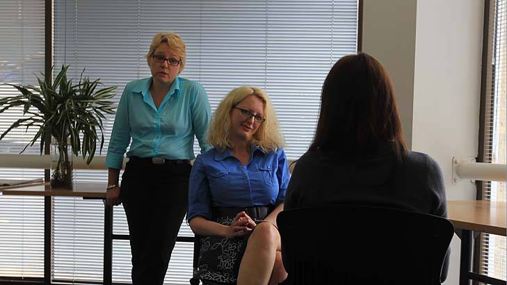 Talk time ... Anita McGregor, far left, supervises Helen Fearnley counsel Sarah.