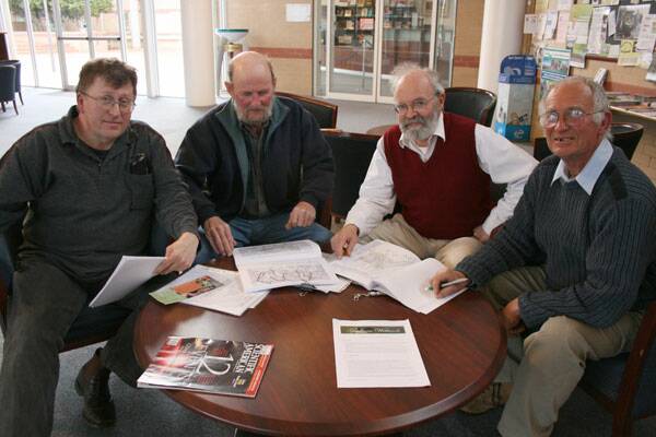 MIGHTY EFFORT: Goulburn Wetlands Project working party members (from left) David Marsden-Ballard, Bill Wilkes, Rodney Falconer and Ray Shiel peruse the results of their work, presented to a council committee last week.