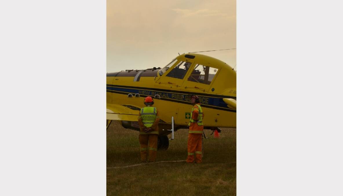Volunteers Filling up Bomber 223 (VH-CVF) with fire retardant at Goulburn Airport 23/12/12 