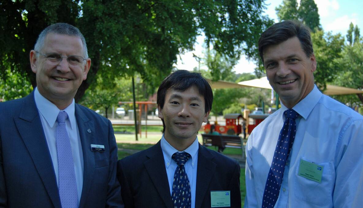 Mayor Geoff Kettle (left) and Hume Liberal candidate Angus Taylor (right) pictured with General Manager of Japan Rail Gen Okajima during the fast train and freight rail forum in Goulburn yesterday. 