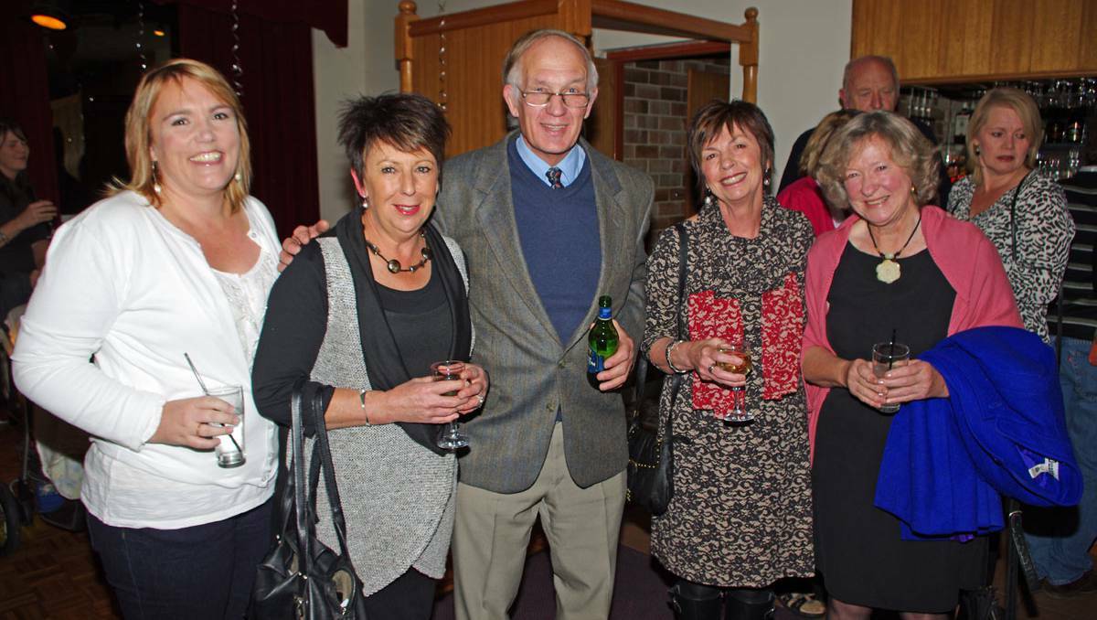  Sarah Wilkinson, Sharon Grocott, birthday boy Tom Lyttle, Elaine Shepherd and Anne Gerard at Mr Lyttle’s 70th birthday party on Saturday. Photo DARRYL FERNANCE.