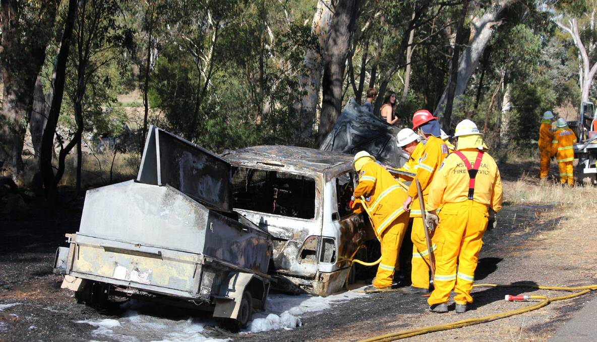 Car fire on the Hume Highway near Dalmeny Lane - Photos ANTONY DUBBER and DAVID LUCKIE