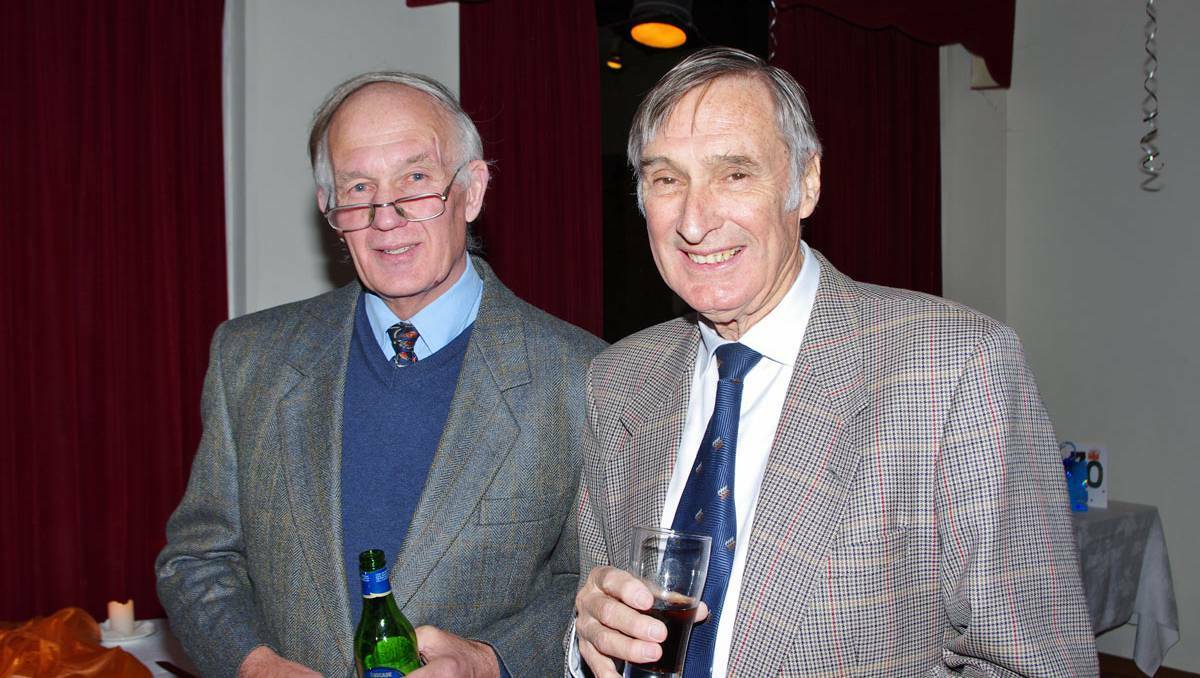 Popular surgeon Tom Lyttle, pictured with good mate Jack Micklethwaite, announced to a room full of work colleagues family and friends that he intends to retire in September this year at his 70th birthday party. Photo DARRYL FERNANCE.