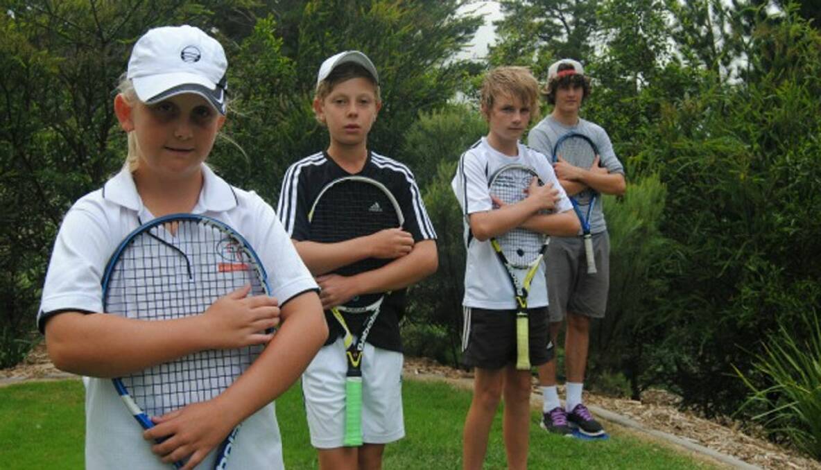 SMOKING ACES: Teenagers Corey Greenwood and Jarred Twadell (pictured far right of photo) are at present testing their mettle at the NSW state championships at Homebush. Hayley Cooper and Matt Chapman (left of picture) will soon follow their lead. 