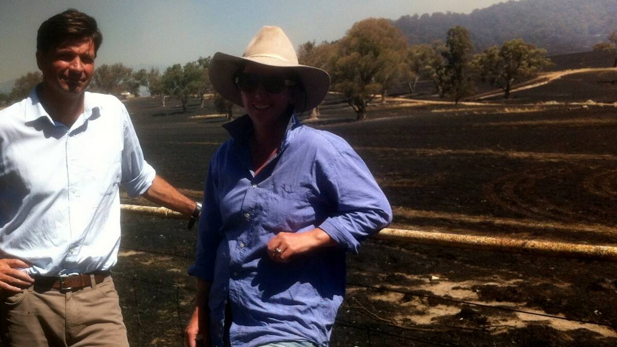 Angus Taylor at Jugiong fire with Caroline Anderson.