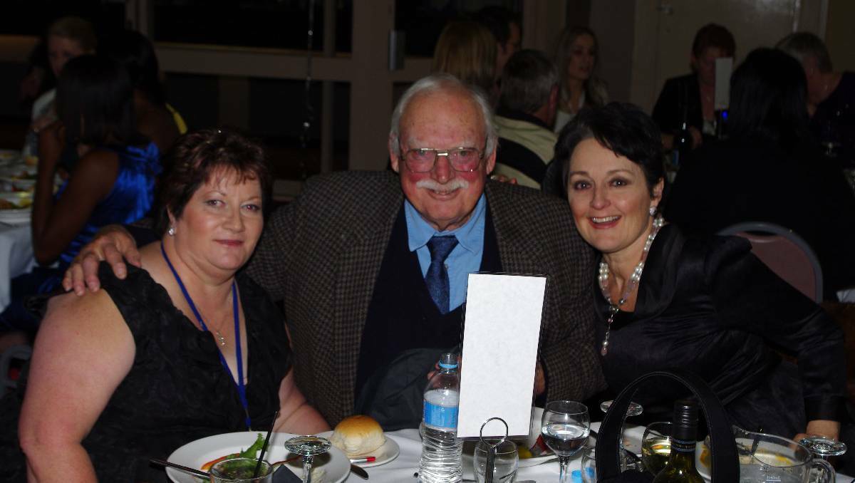  Among the guests at the Make a Wish dinner was Member for Goulburn Pru Goward, puictured here with her husband David Barnett and a friend. Photo DARRYL FERNANCE