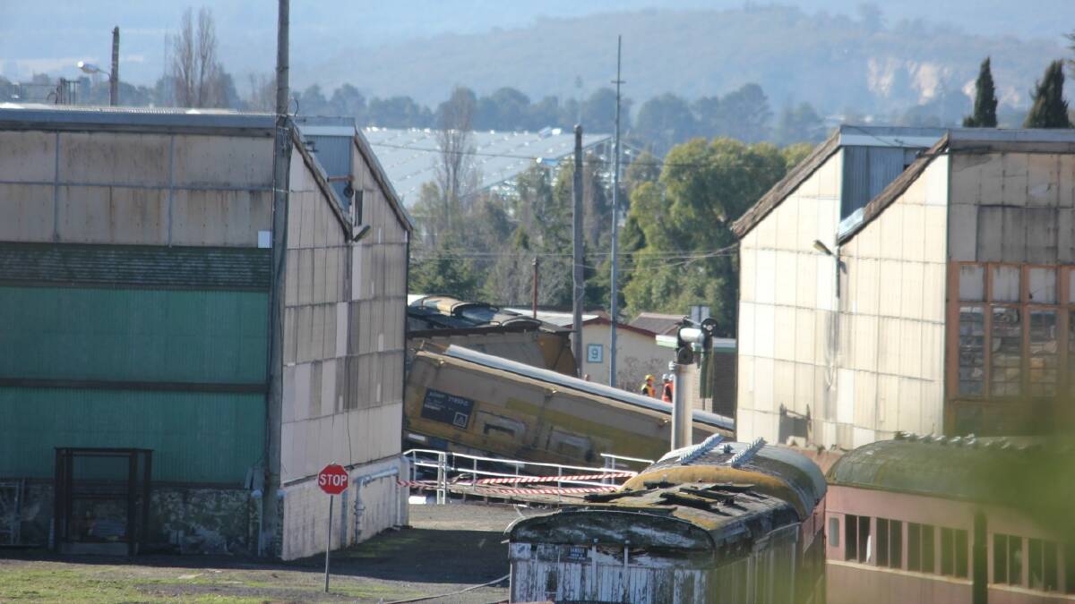 WHOOPS: A view of one of the wagons which derailed after an Aurizon freight train crashed through a locked gate and into the Goulburn Roundhouse on Sunday night. The Goulburn Post was not permitted to go on site on Monday with authorities citing safety reasons. Photo: Antony Dubber.