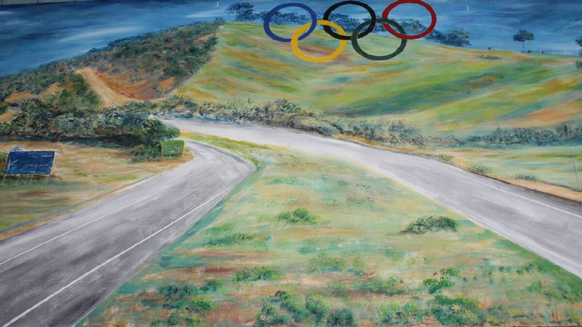   ANYTHING’S POSSIBLE: An artist’s impression completed in 2001 depicting the Olympic rings set into a hill above the Hume Highway near South Goulburn McDonald’s. Former Goulburn City Mayor Tony Lamarra says the project is still possible, even if it’s in another location.