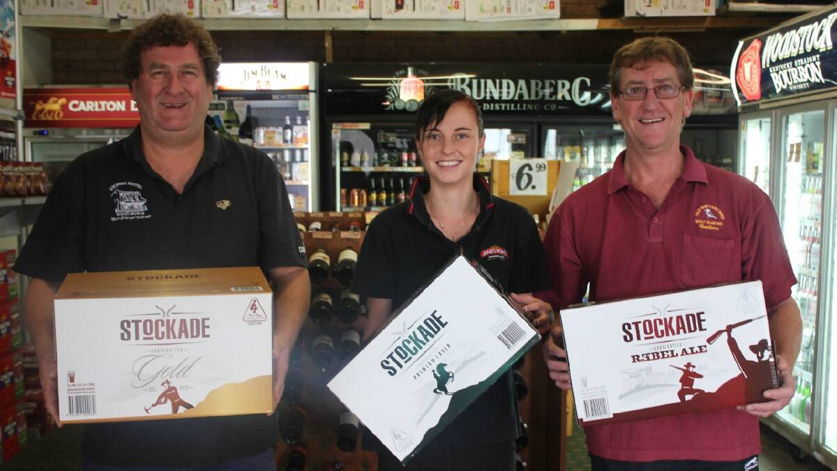 NEW PRODUCT: Bottleshop manager Wayne Kimber, Empire staff-member Nicolle Sato and Manager Paul Todkill with the new Macarthur Brewery Stockade Products.