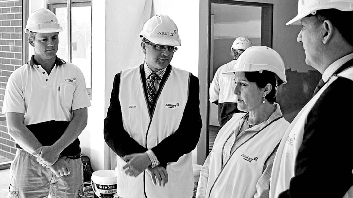 Goulburn MP Pru Goward chats with health service staff and contractors at the new Chisolm Ross extensions last October.