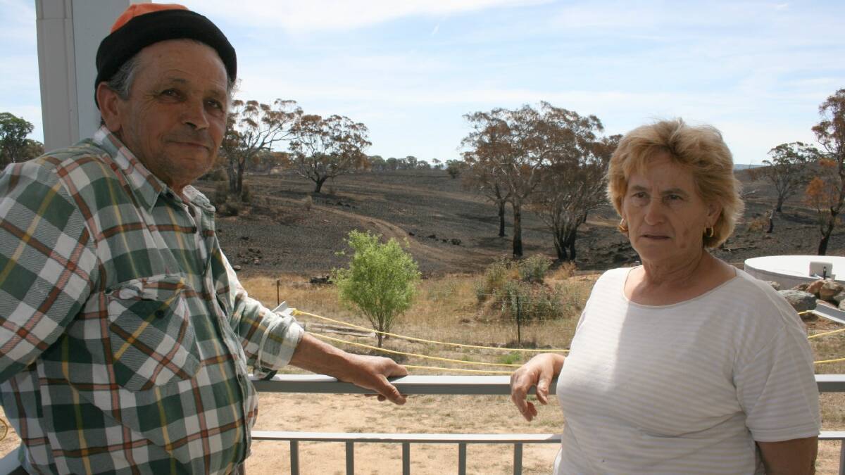  “HORROR DAY:” Luigi and Anna Cortese lost 90 acres of their Shaws Creek Rd property in the recent fire, which came within 20 metres of their home.