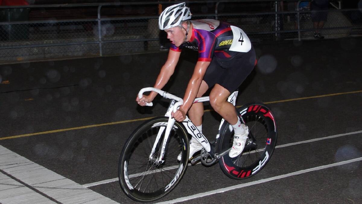      PUSHING HARD: Goulburn Cycle Club’s Mark Gibson crossing the line ahead of fast finishing Jack Edwards and Tom Clark in the rain soaked final event on Saturday night.