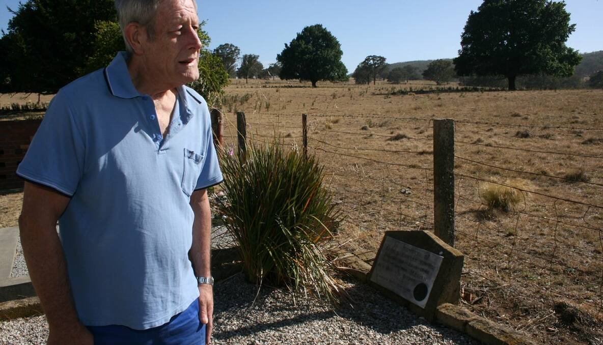 SAVING HISTORY: Local war historian and Goulburn RSL Sub Branch secretary Rod MacLean hopes some resolution can be reached to avoid The Forest Cemetery being sold for unpaid rates. Behind him is the grave of Henry Robert Grubb who was killed in action in France in 1916. The ‘Dead Man’s Penny’ is set into the headstone, which also includes the names of his parents, Marian and Arthur.