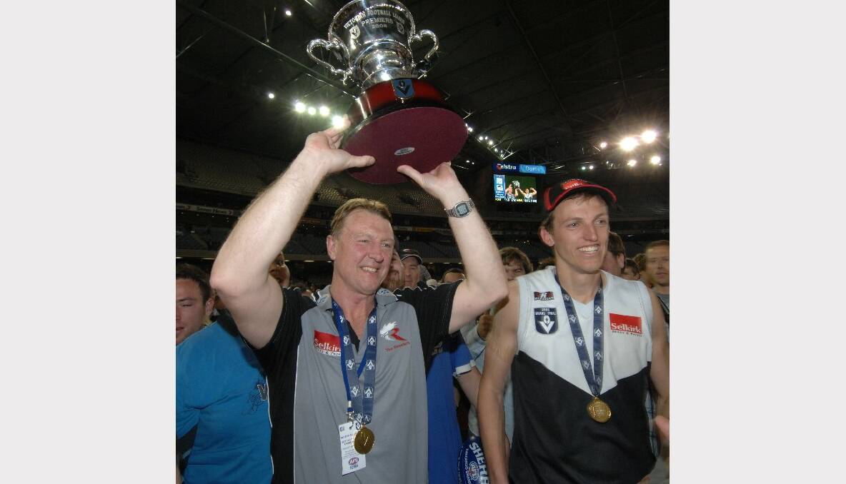 SEPTEMBER 26, 2008: After two earlier grand final losses, the North Ballarat Roosters finally claimed a VFL flag. Coach Gerard FitzGerald and captain Shaune Moloney are pictured with the cup, which the pair would hold aloft again the following season.