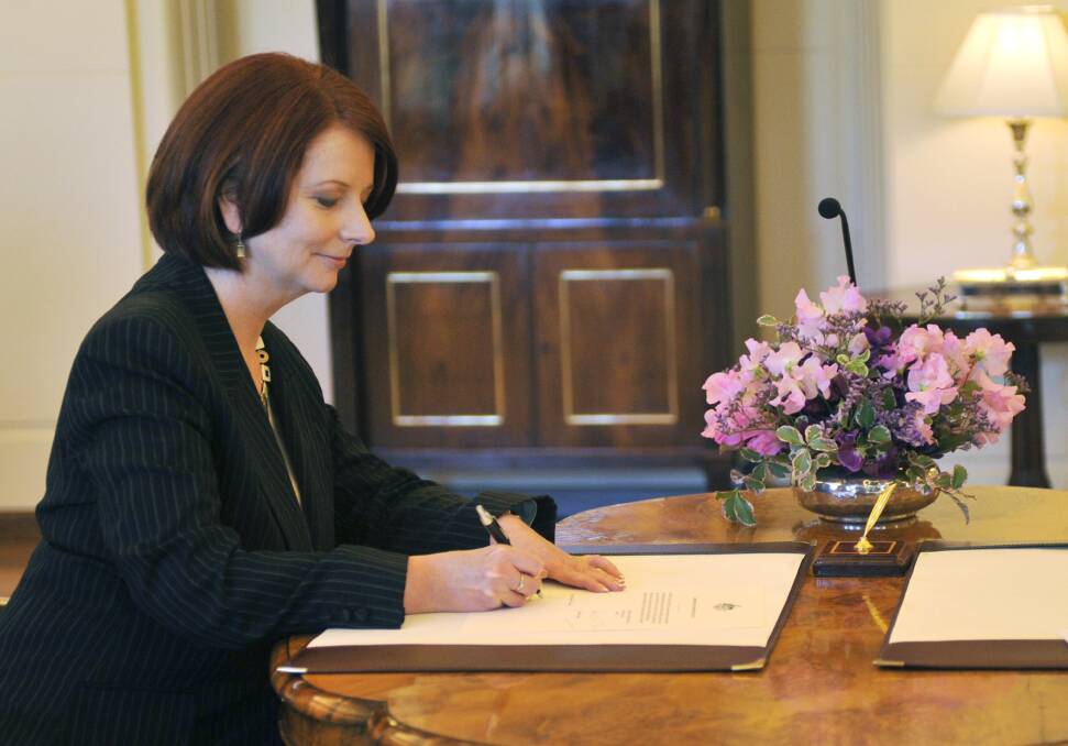 Newly appointed Australian Prime Minister Julia Gillard is sworn in by Governor General Quentin Bryce during a ceremony at Government House on June 24, 2010. Photo: Getty Images