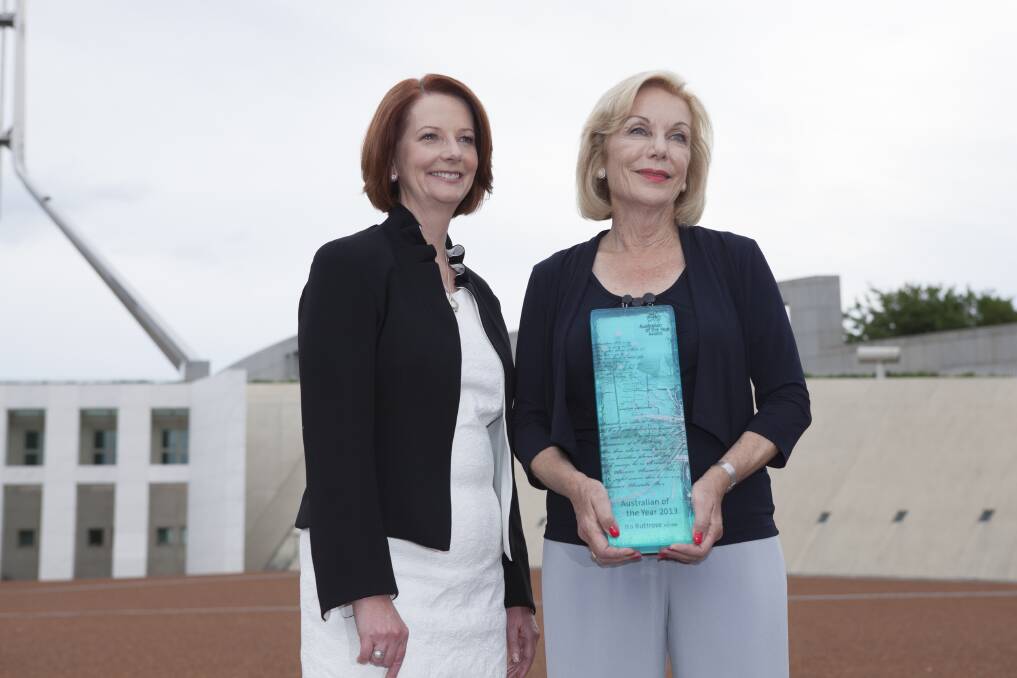Julia Gillard posed for photographers with Australian of the Year, Ita Buttrose on January 25, 2013 in Canberra. Photo: Getty Images