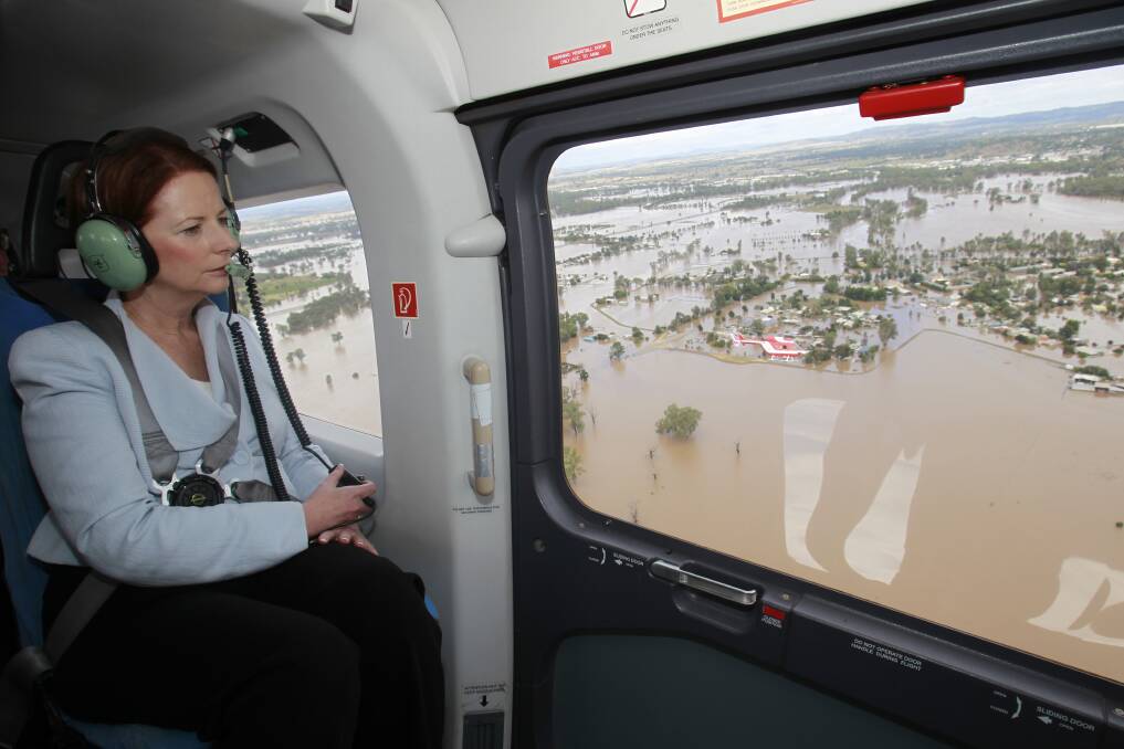 Prime Minister Julia Gillard flies over floodwaters that inundated Wagga Wagga on March 7, 2012. Photo: Getty Images