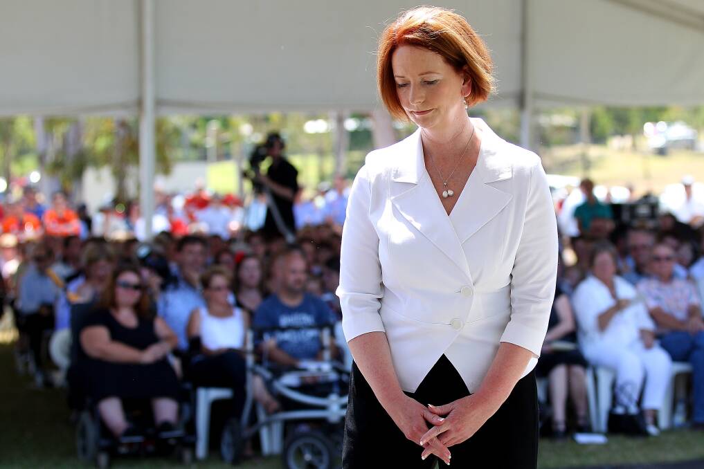 Prime Minister Julia Gillard during a memorial of the inland tsunami which killed 23 people, held in Lake Apec Park on January 10, 2012 in Gatton. Photo: Getty Images 